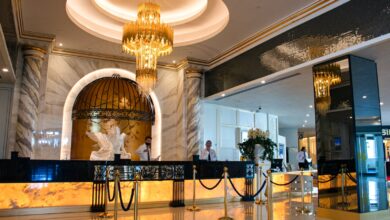 gold chandelier on white ceiling